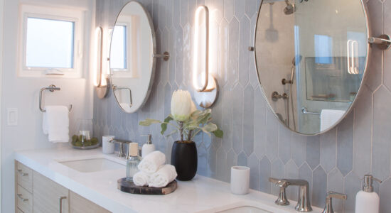La Jolla Guest Bath with light wood cabinets and soft blue/gray tilework.